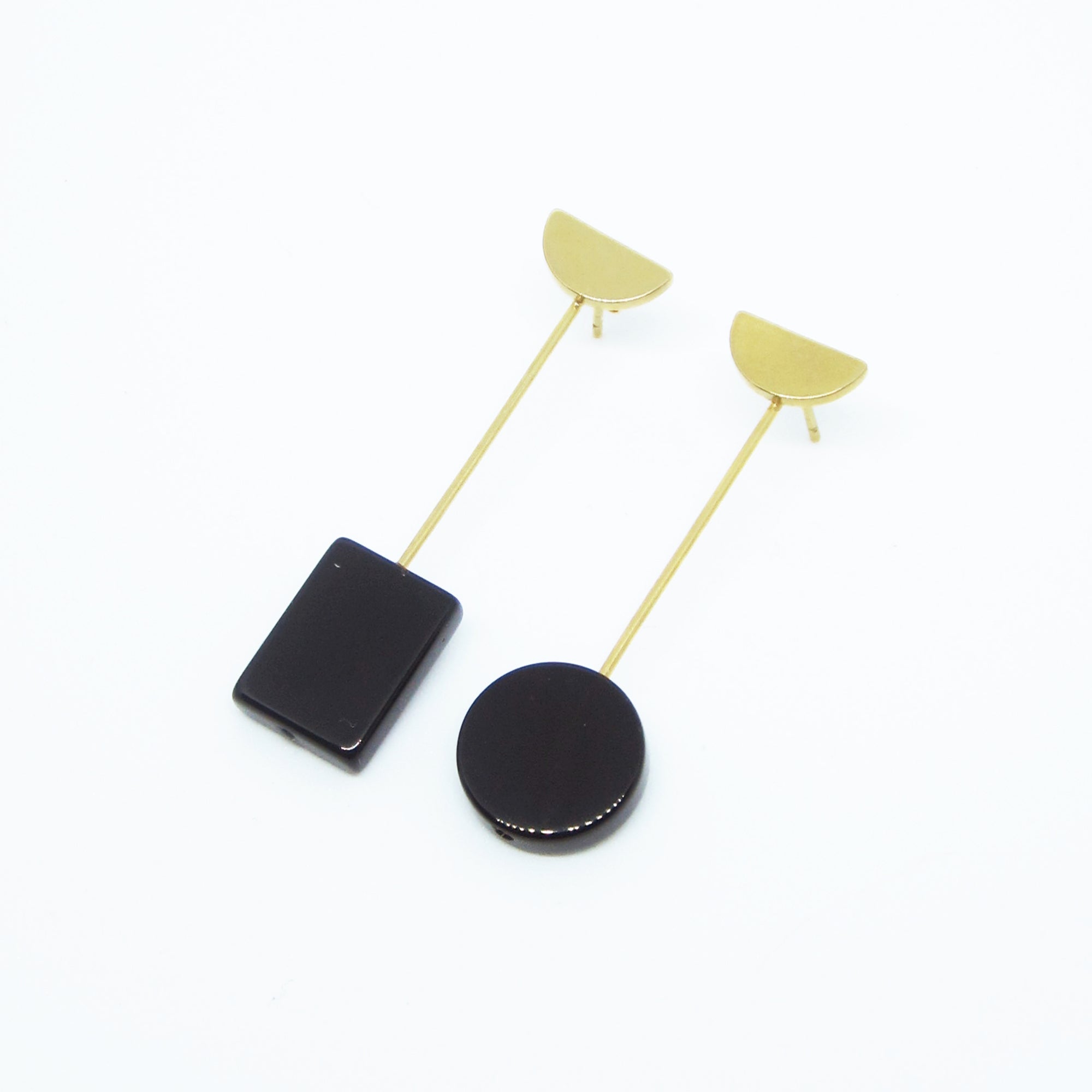 MISMATCHED EARRINGS